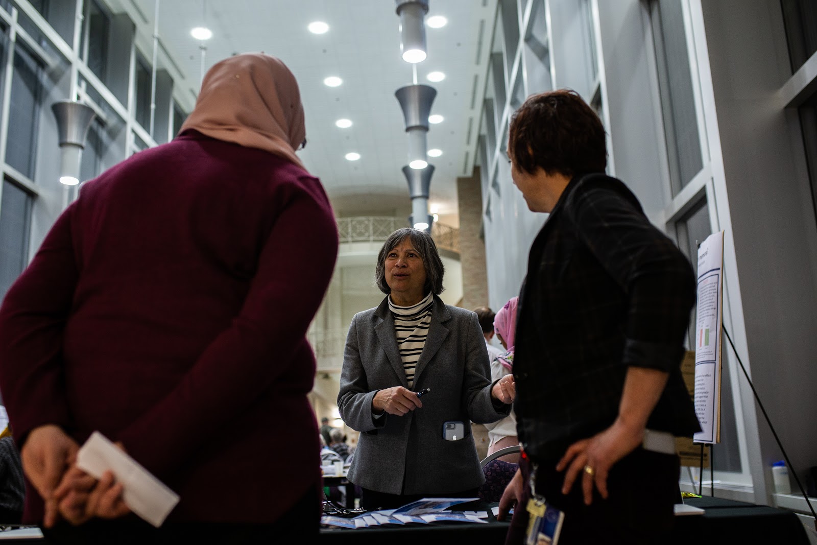 Professor Maythee Kantar at the registration table for the 2018 Student Poster Conference. Kantar is a member of the Student Scholars Committee, a group of faculty that organize research opportunities for undergraduate and graduate students at Metro State. Photo by Eli Bartz