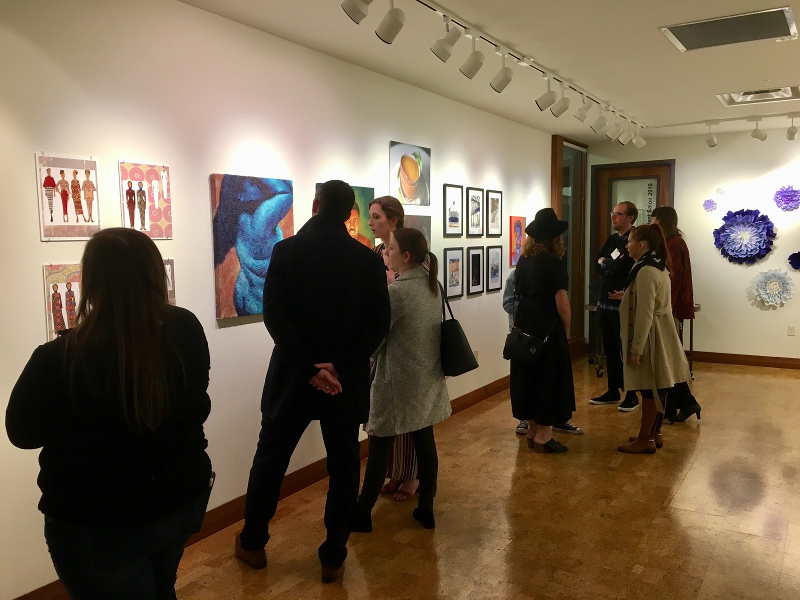 More than 100 people attended the opening night reception of the 2019 Student Salon in the Gordon Parks Gallery on March 21. The show features the work of seven studio arts majors and two individualized studies majors. (Photo by Kathryn Ganfield / The Metropolitan)