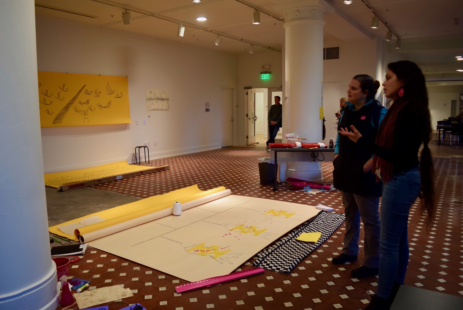 The Metropolitan’s reporter April Carlson, left, in conversation with artist-in-residence Rebekah Crisanta de Ybarra in The M's new Center for Creativity. The space will offer studio art classes, educational programs and intergenerational creative workshops.