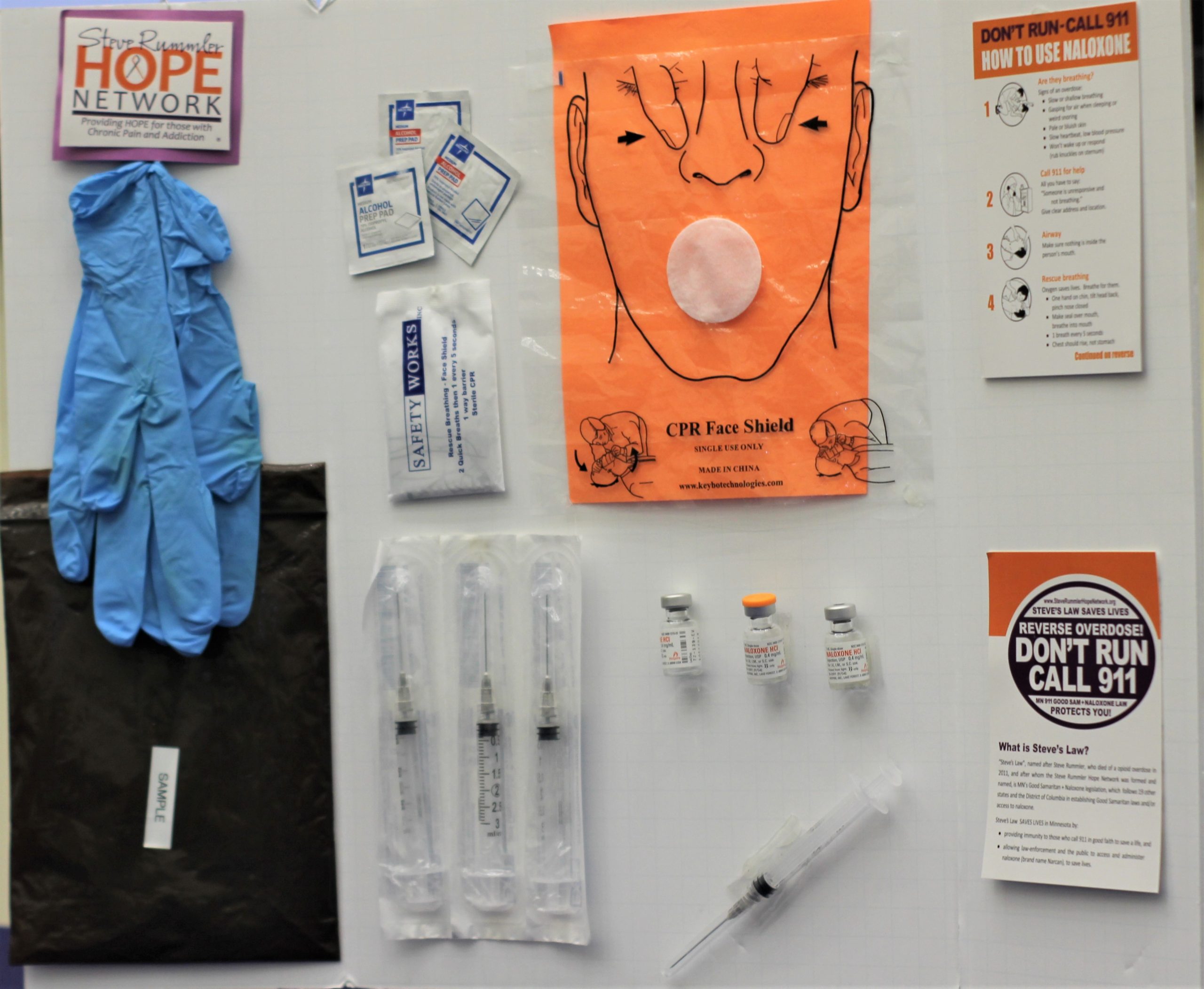 A poster board  is displayed during recent Metro State seminar discussing life saving measures to combat opioid abuse crisis. Attached to the board are items found within a standard emergency recovery kit. This event was held on March 3 and conducted by the Steve Rummler Hope Network (Brandon General/The Metropolitan)